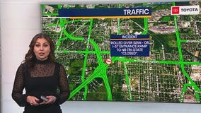 Semi carrying 53,000 lbs of peanut butter rolls over on I-57 ramp