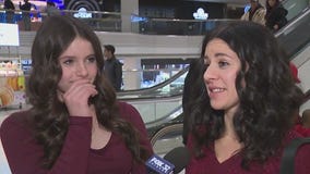 Last-minute shoppers dash to Woodfield Mall before Christmas