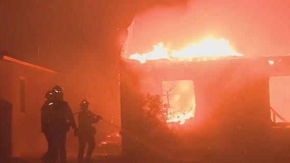 Death toll rises as wildfires continue to scorch Los Angeles area