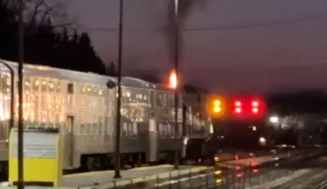 Video shows flames coming from Metra train