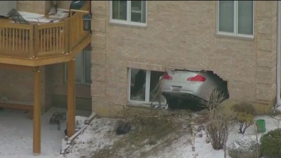 Car crashes into Lake of the Hills home