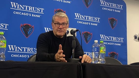 UConn's Geno Auriemma talks Doug Bruno after the Huskies win over DePaul