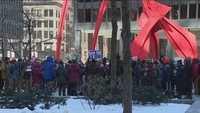 Federal workers rally in Chicago in response to Trump admin's mass firings