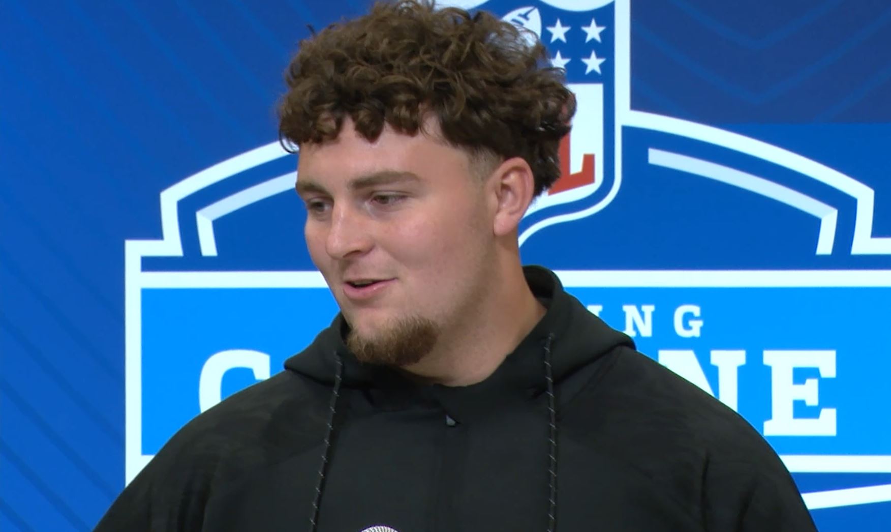 Defensive tackle Mason Graham speaks at NFL Combine
