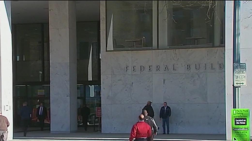 Judge orders rehiring of probationary workers