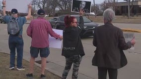 Protesters rally at Schaumburg Tesla dealership against Elon Musk