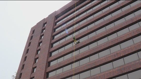 Going over the edge: Rappelling trend takes off in Itasca