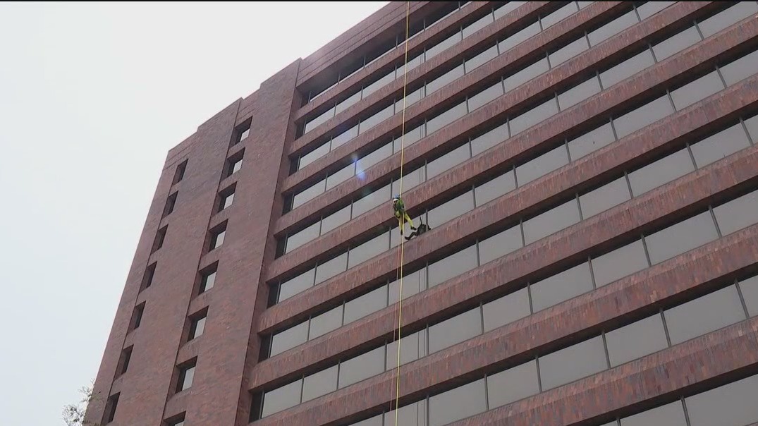 Going over the edge: Rappelling trend takes off in Itasca