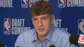 Illinois basketball star Kasparas Jaku?ionis talks at the NBA Combine