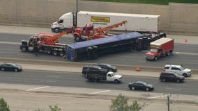 All I-55 northbound lanes closed after semi truck overturns near Woodridge