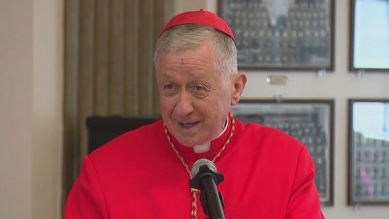Cardinal Cupich meets Chicago students who recreated papal conclave