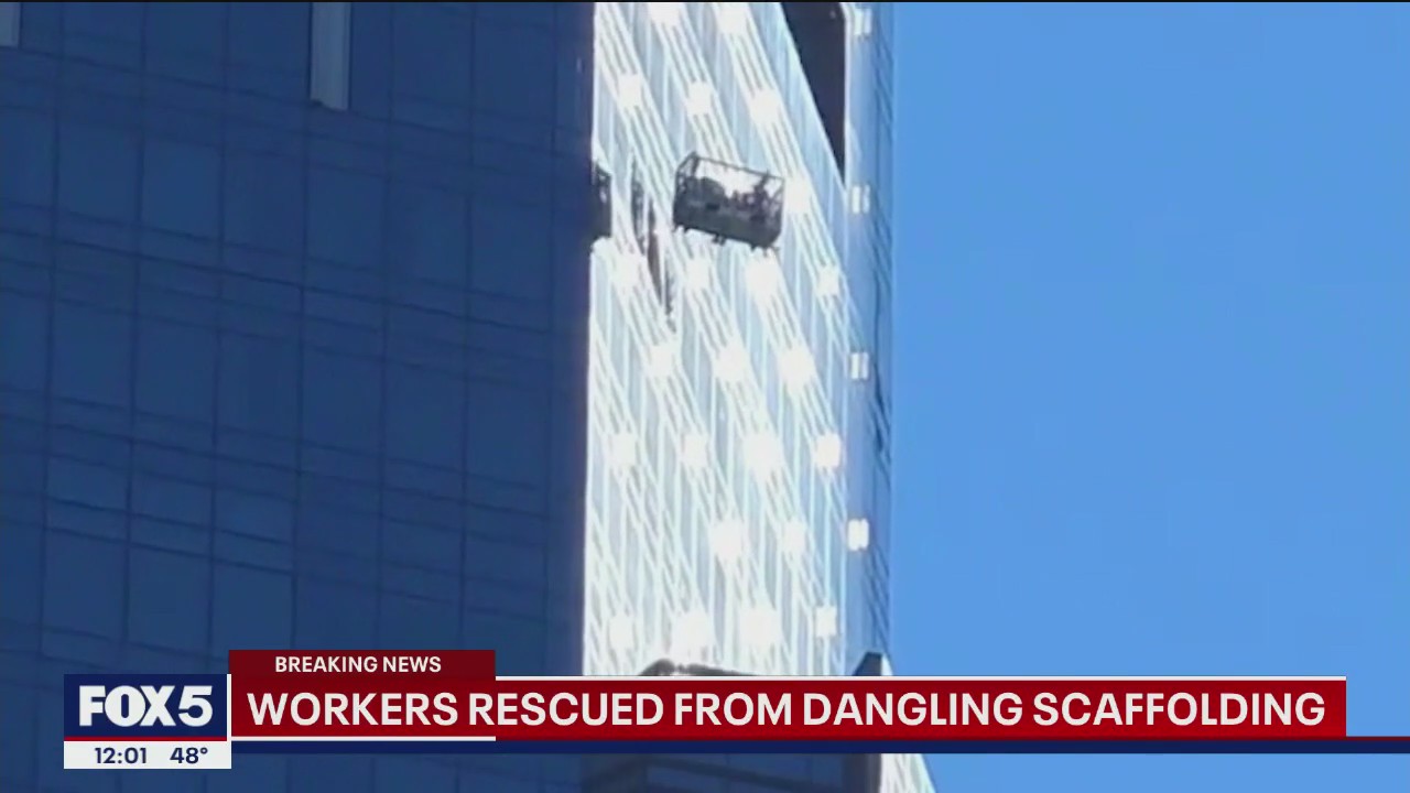 NYC window workers rescued from dangling scaffolding