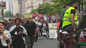Anti-ICE demonstrators march in downtown Chicago