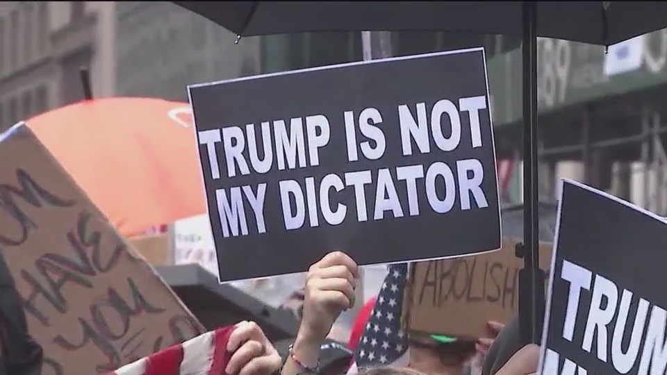 No Kings protests fill streets of US cities as Trump oversees Army birthday parade