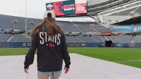 Chicago Stars forward Ally Schlegel kicks field goal at Bears Draft Party