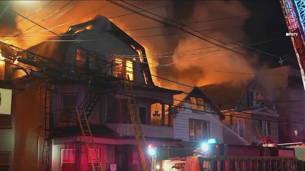 Newark fire rips through homes, displaces dozens