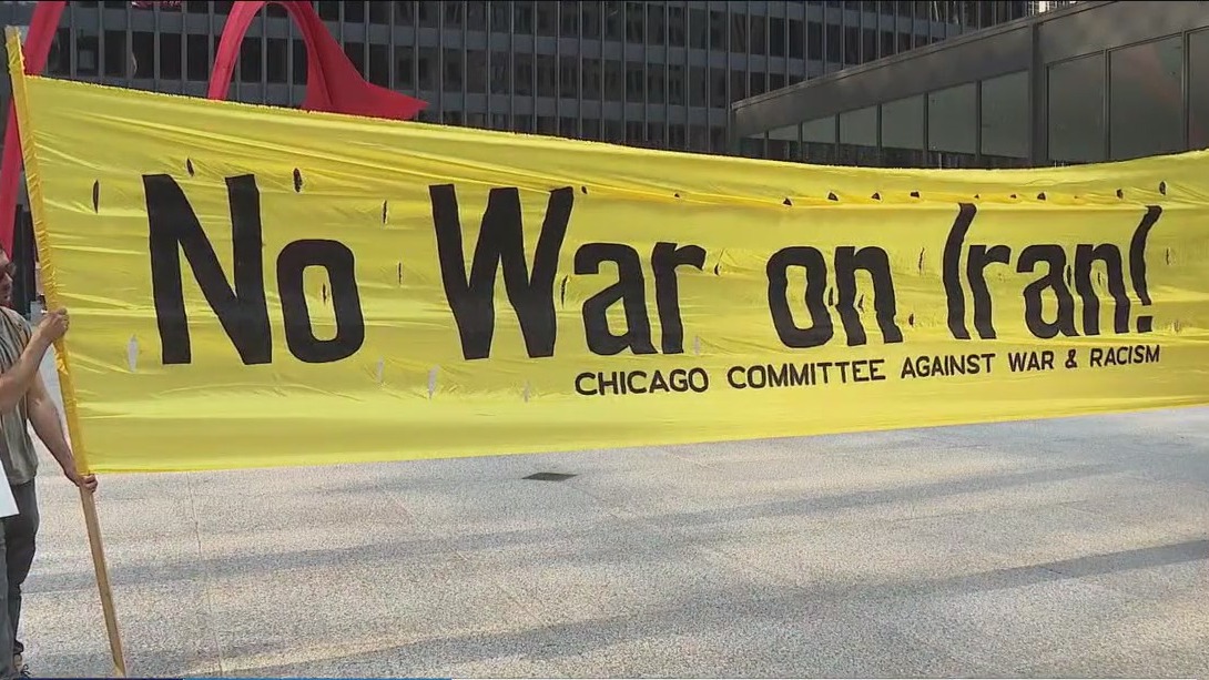Activists gathered in Federal Plaza to denounce U.S. air strikes on Iran