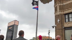 Aurora flag raising change sparks controversy