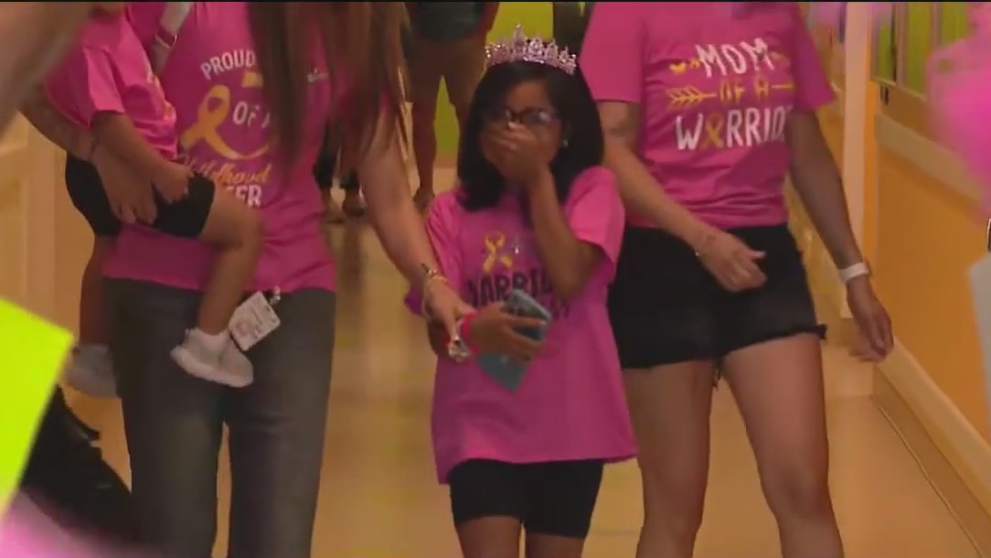 Young Lurie Children's patient rings the bell