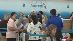 Lines build up at O'Hare Airport as Fourth of July travel gets underway