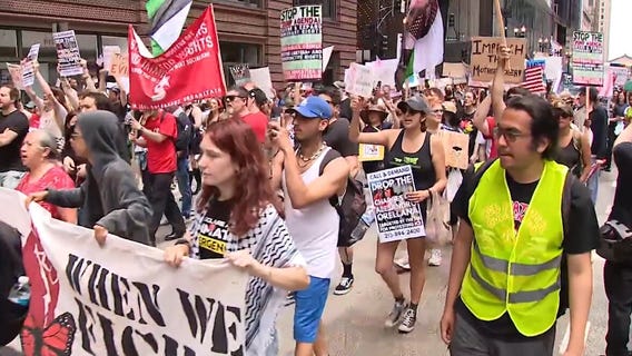Anti-Trump protesters march through Chicago on Fourth of July