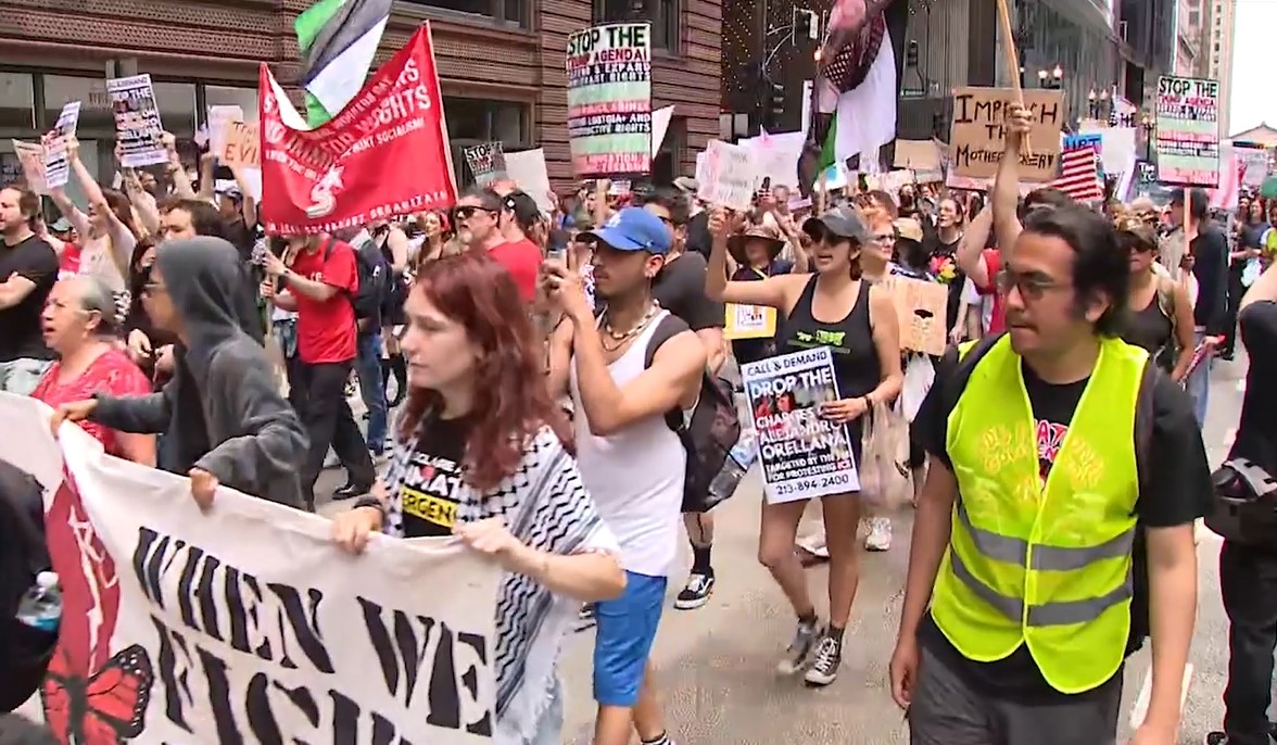 Anti-Trump protesters march through Chicago on Fourth of July