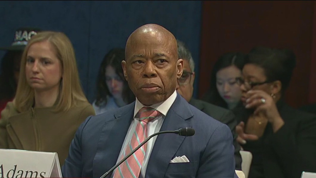 Federal judge urged to drop case against Adams