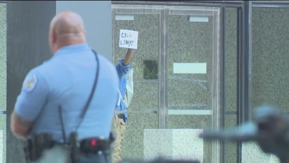 Man barricaded in Dirksen Federal Building taken by ambulance after 9-hour standoff