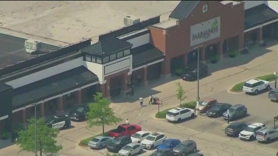 Man charged with gun crimes after police swarm Mariano's