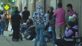 Long lines in Humboldt Park as migrant aid program reopens in Illinois