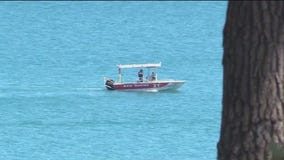 Search for missing swimmer in Highland Park