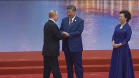 Putin in China as Russia bombards Ukraine