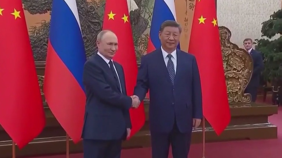 Leaders of Russia, China talk about living forever in 'creepy' exchange