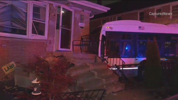 CTA bus crashes into home