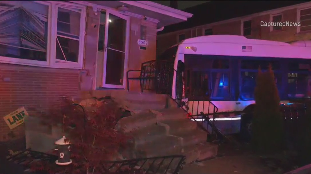 CTA bus crashes into home