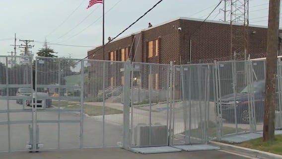 Fencing put up around suburban Chicago ICE processing center