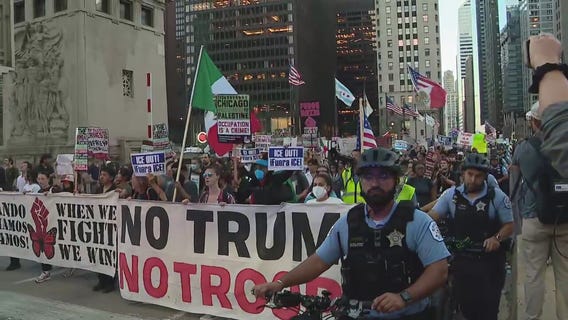 Protesters march in downtown Chicago against ICE