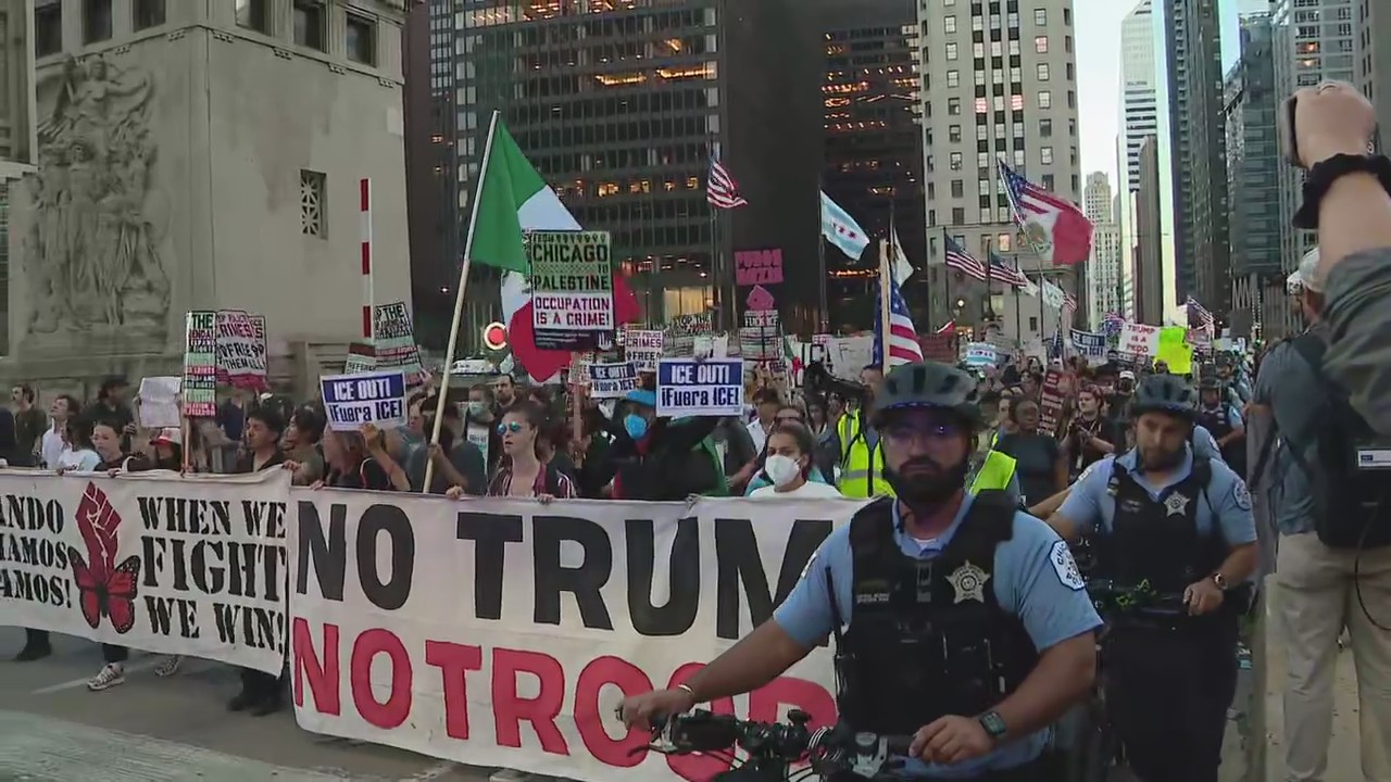 Protesters march in downtown Chicago against ICE