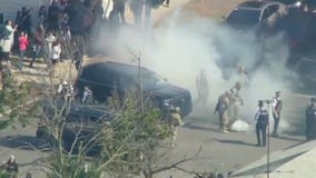 Large crowds tear-gassed by federal agents in Chicago's East Side neighborhood