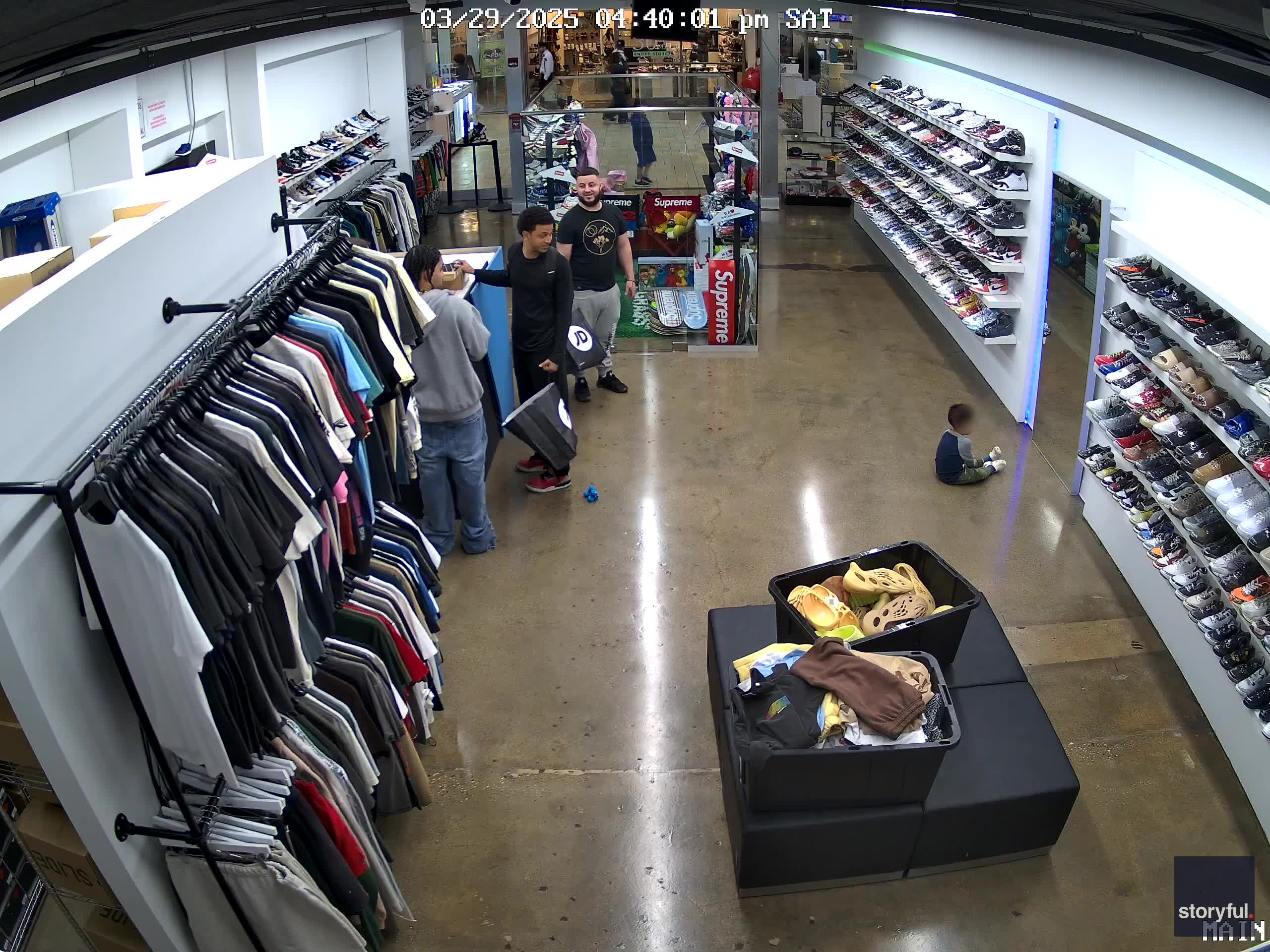 Kid runs straight into mirror at sneaker store