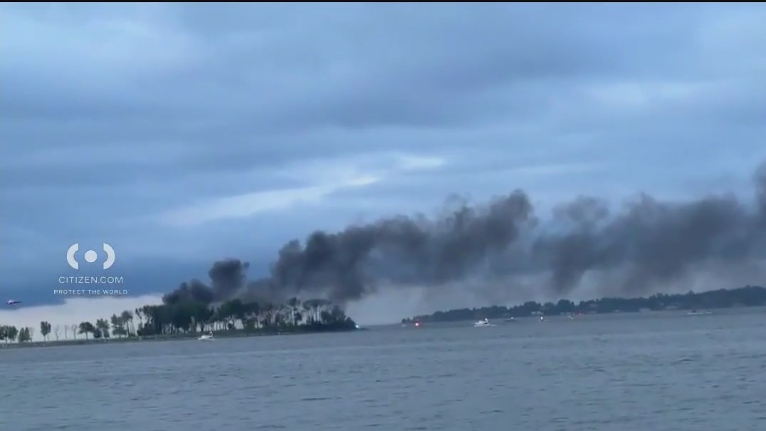 Over 20 rescued from boat fire near Hart Island