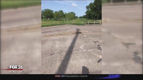 Pasadena road buckles, Red Bluff north of Spencer Highway closed