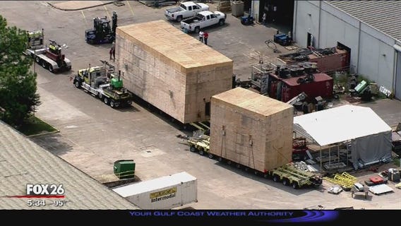 Massive crates being transported from northwest Houston to Bayport terminal