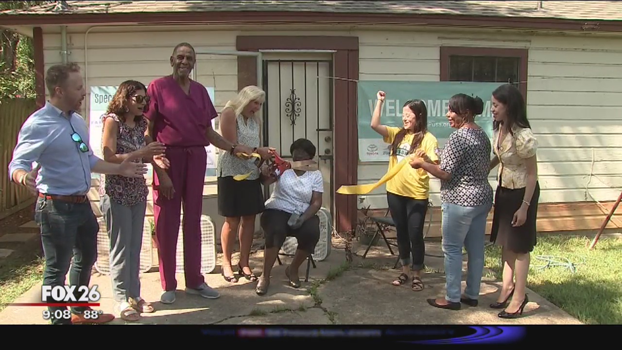 \Woman back home after 2-year wait following Harvey