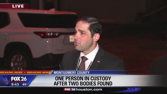 One person in custody after two bodies found
