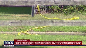 Police officer struck by gunfire during homicide investigation on Long Island
