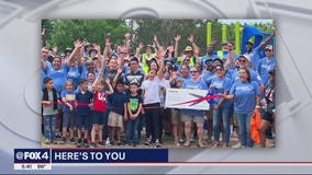 Volunteers renovate elementary school's playground