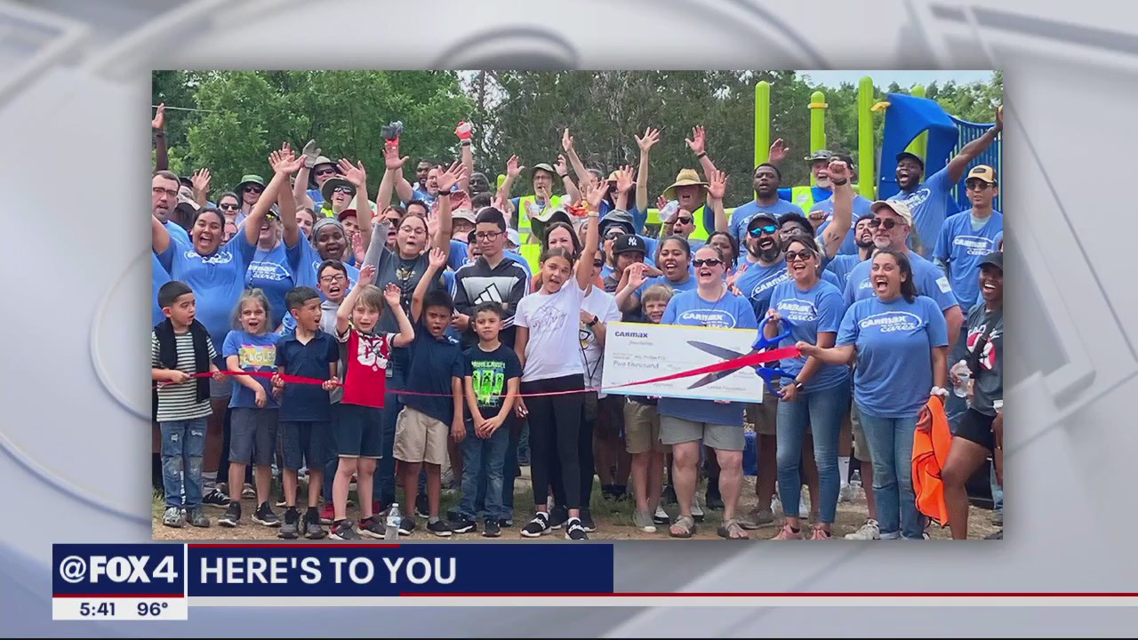 Volunteers renovate elementary school's playground