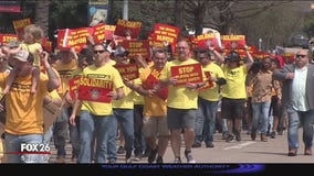 Firefighters march on City Hall