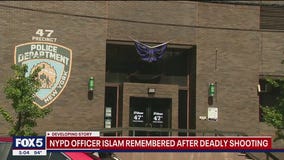 Dignified transfer of fallen NYPD officer, victim of NYC shooting